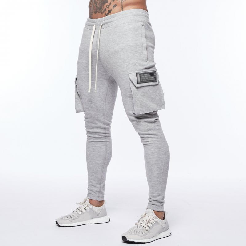 Mens Solid Color Multi-pocket Elastic Waist Sports Trousers 06988156Z