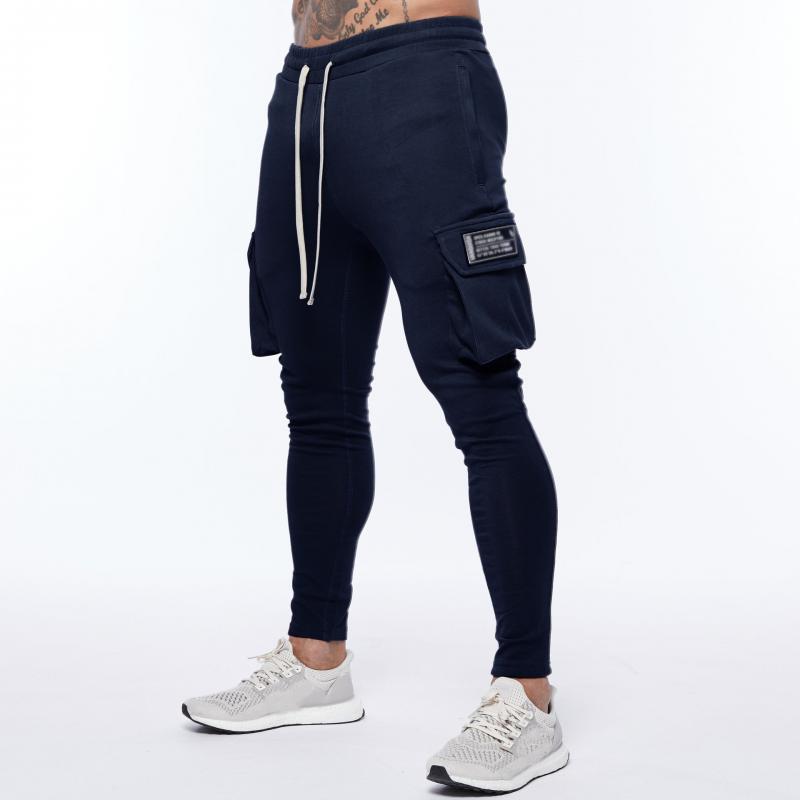 Mens Solid Color Multi-pocket Elastic Waist Sports Trousers 06988156Z