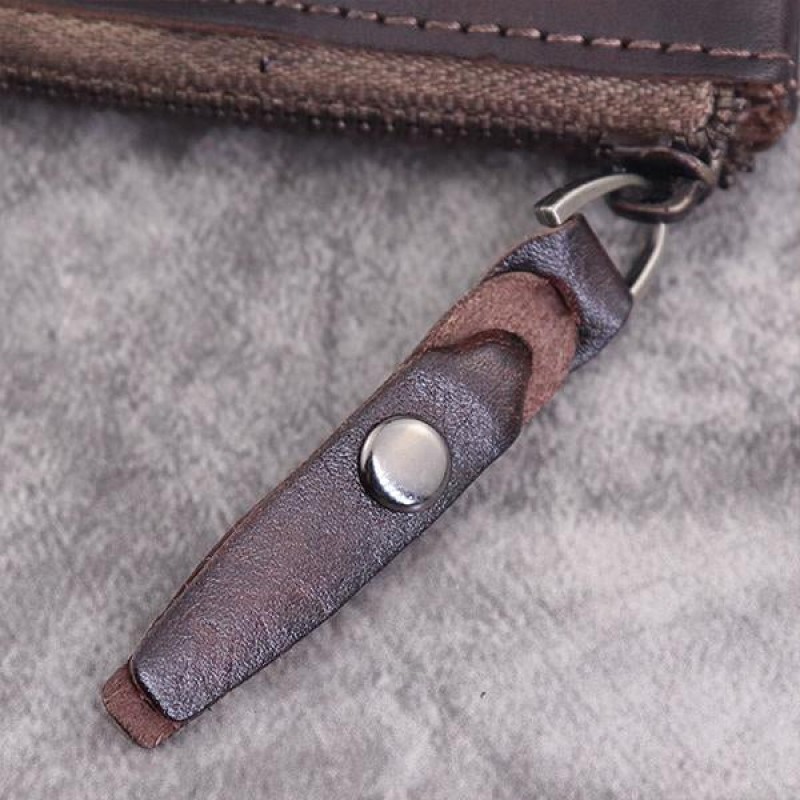 VINTAGE HANDMADE COWHIDE WALLET 65218738M